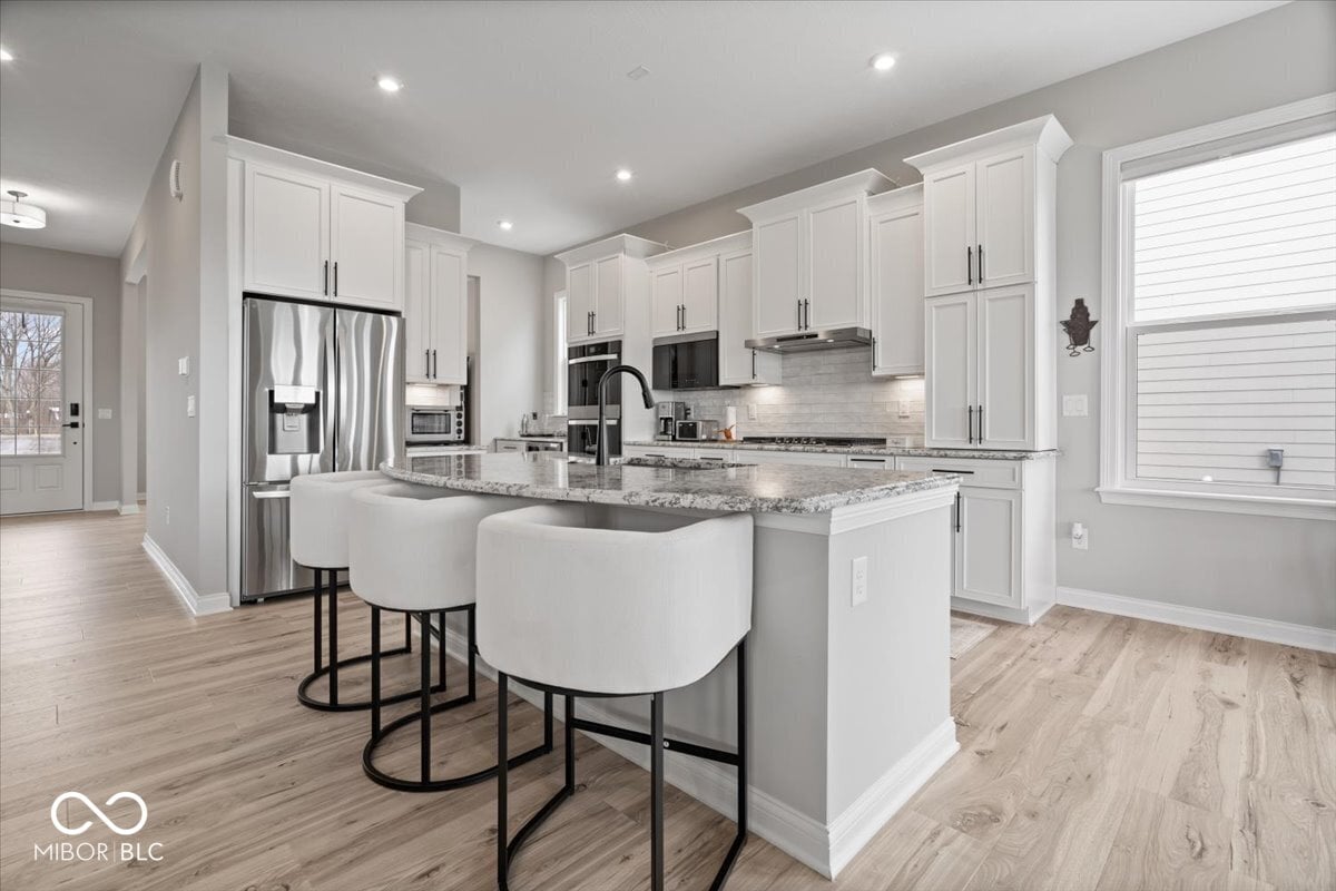 Bright, modern kitchen with spacious island and premium finishes.