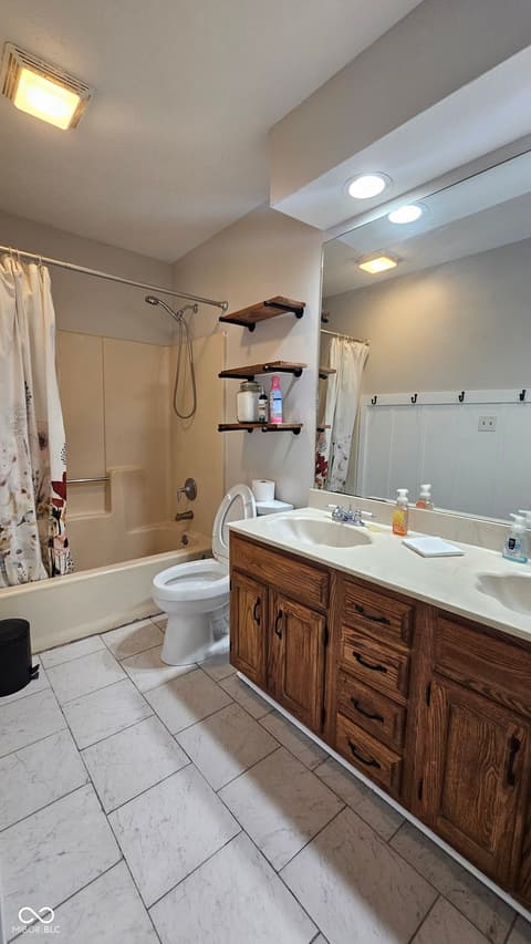 Primary bathroom at 843 Westridge Circle, Noblesville, IN — Spacious primary bath with double vanity and modern updates