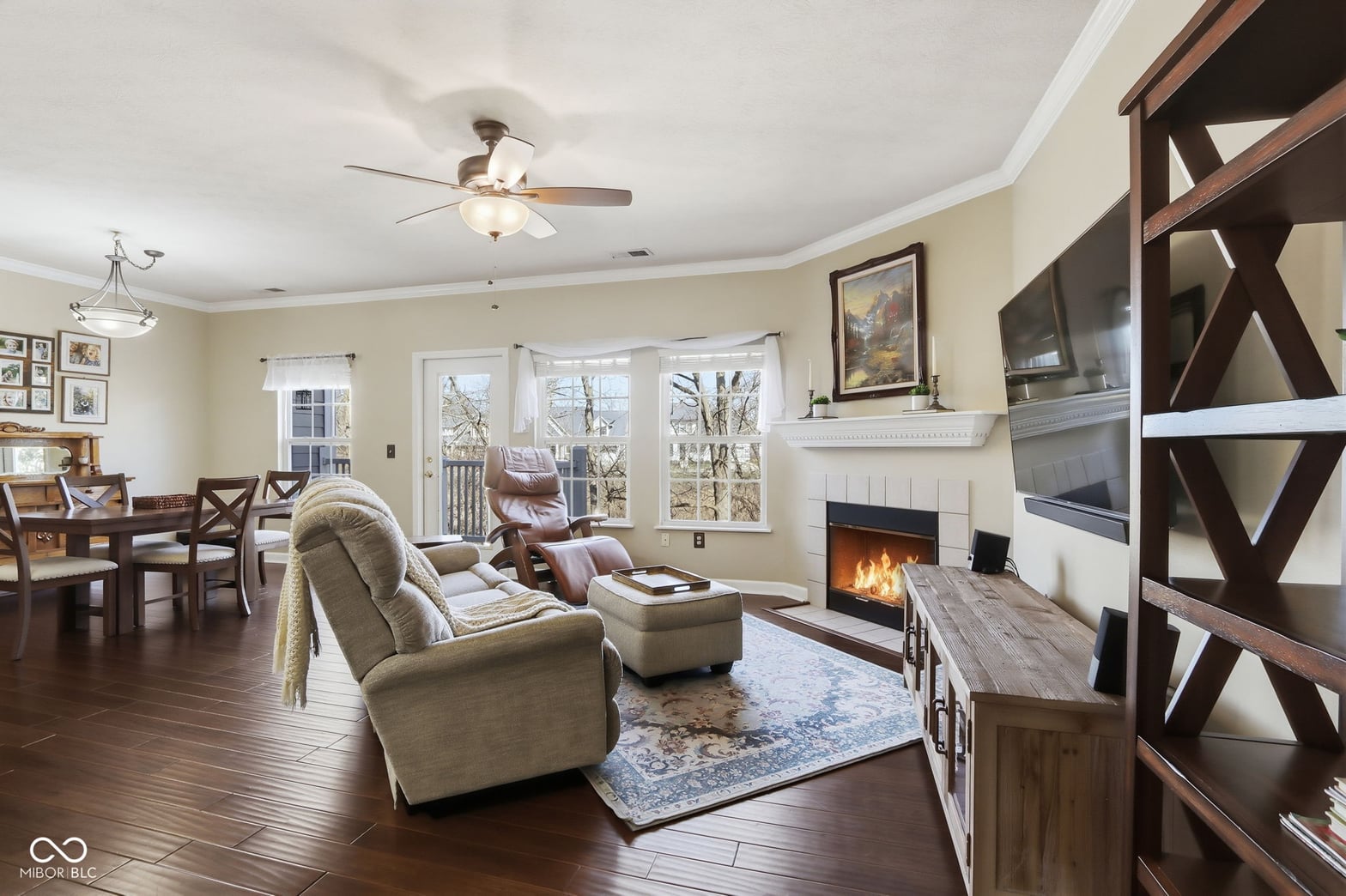 Spacious family room with fireplace and abundant natural light