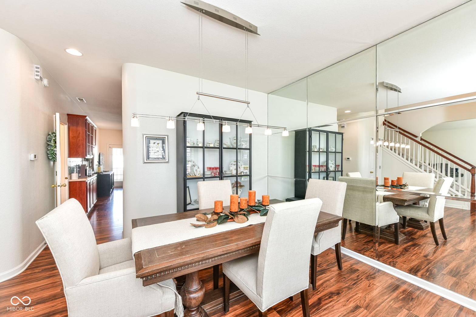 Bright open concept dining with soaring ceilings and modern style.