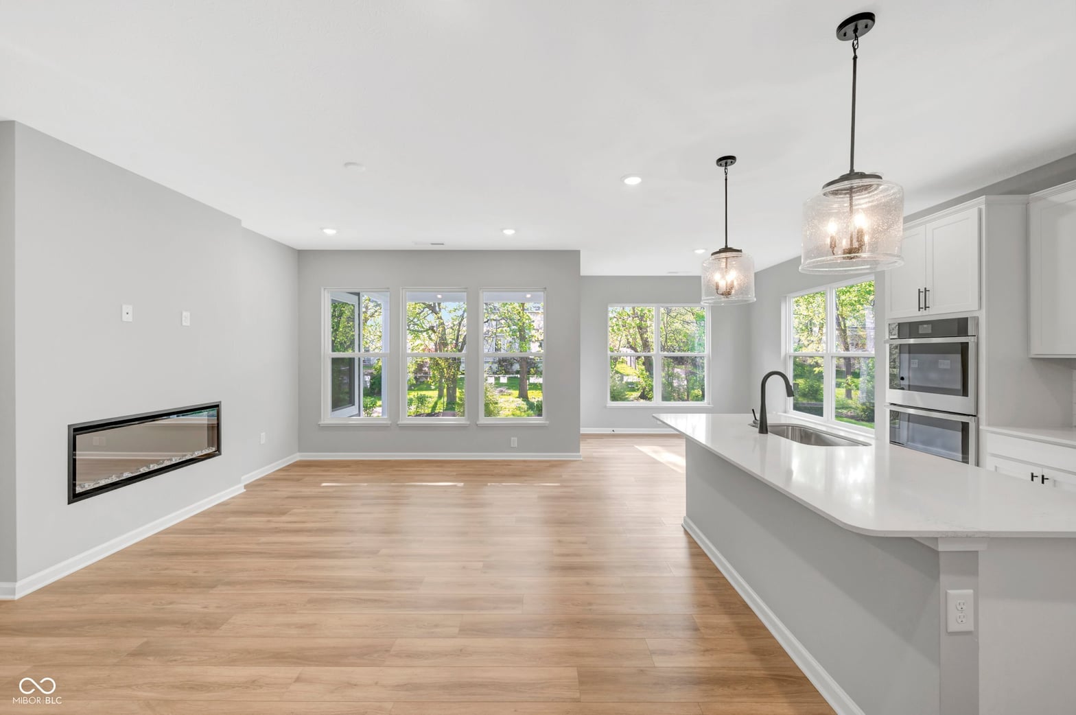 Bright modern kitchen with abundant natural light and luxury finishes.