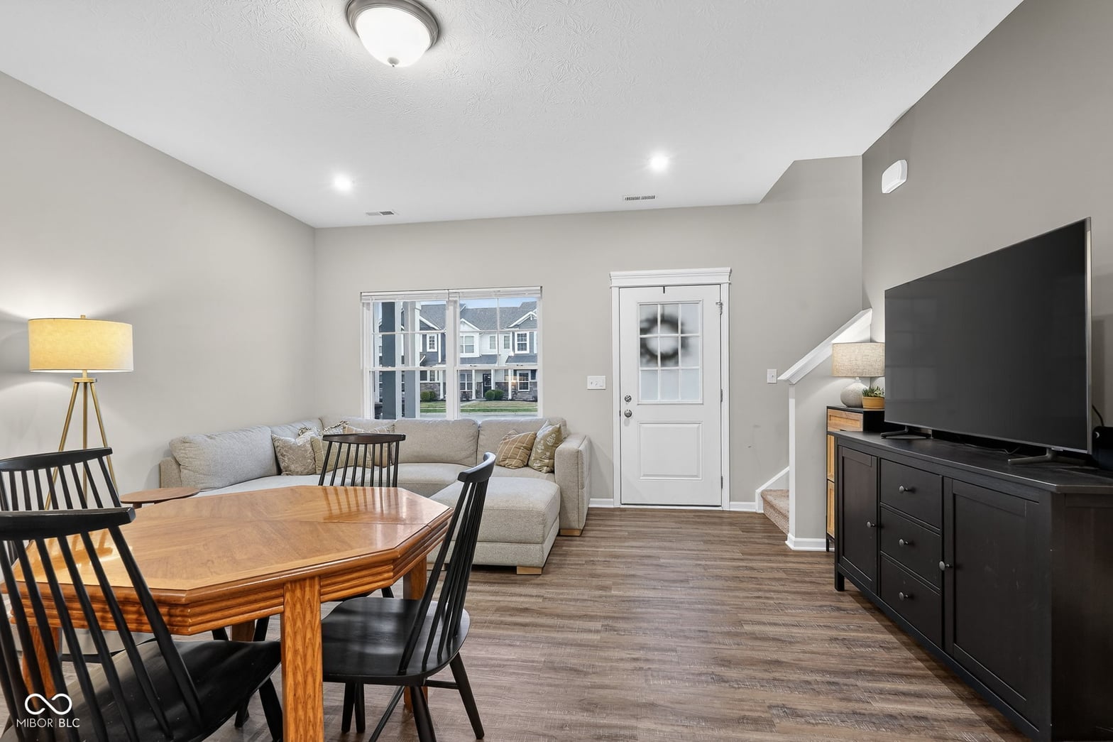 Bright open concept family room with modern finishes.