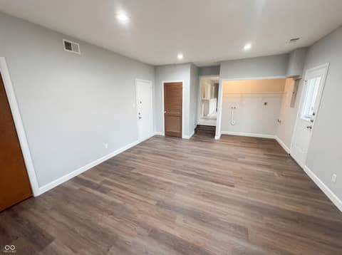 Primary bedroom at 10209 Broadway Street, Indianapolis, IN — Spacious primary bedroom with ensuite and updated finishes.