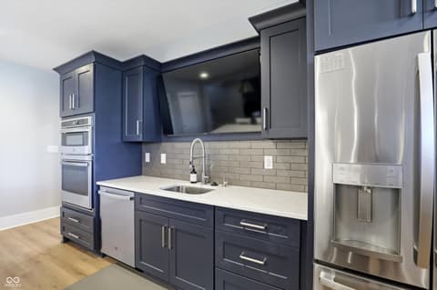 Kitchen at 17112 Sanders Farm Circle, Westfield, IN — Chef's kitchen with luxury finishes and high-end appliances.