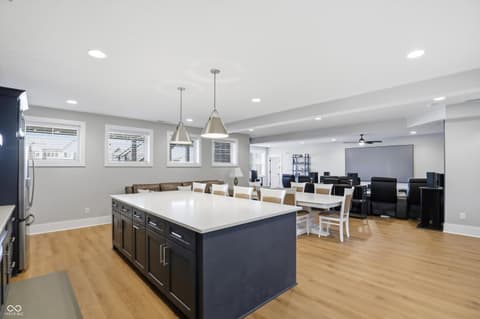 Kitchen at 17112 Sanders Farm Circle, Westfield, IN — Modern kitchen with large island and open living space.