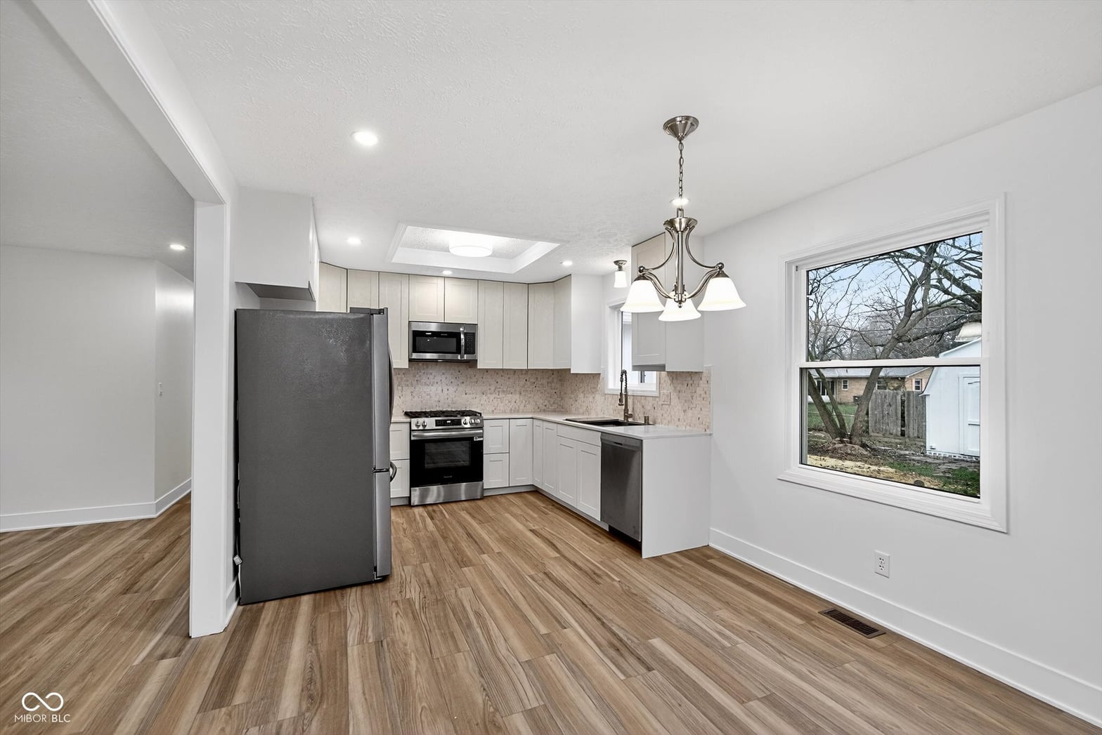 Bright, updated kitchen with premium stainless appliances.