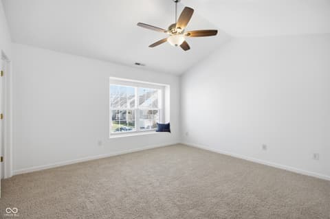 Bedroom at 12706 Brewton Street, Fishers, IN — Bright bedroom with large windows and modern amenities.