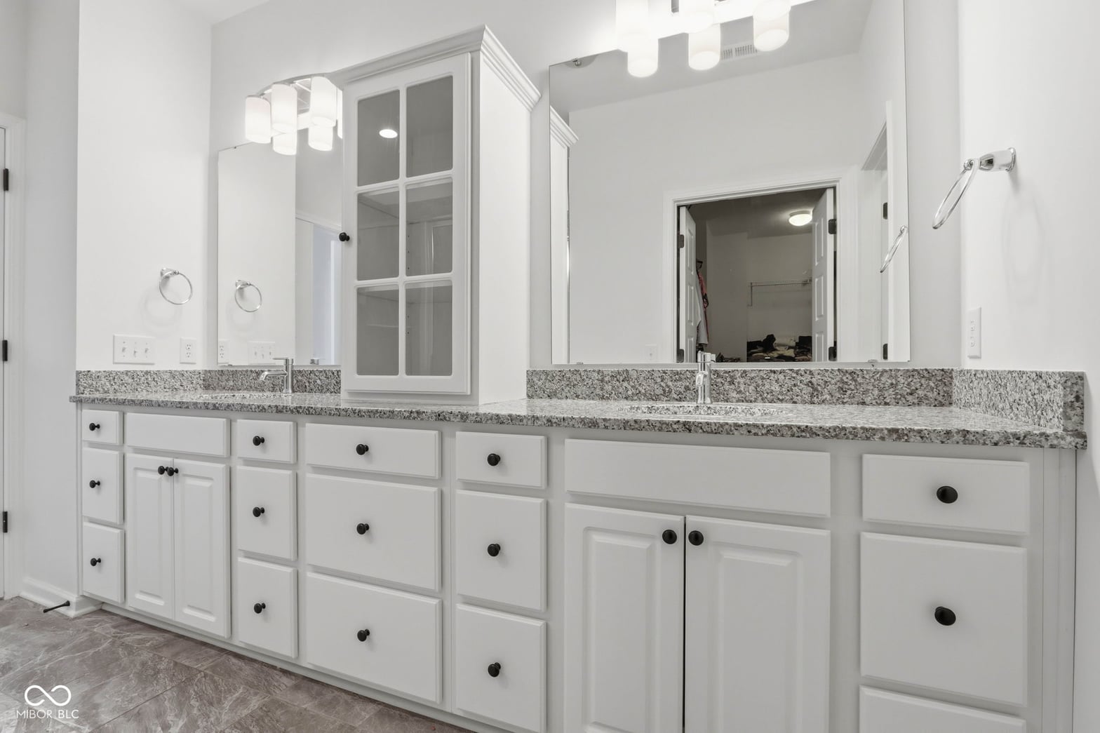 Luxurious primary bath with spacious double vanity.