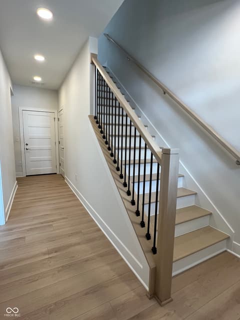 Foyer at 185 Midland Trace Loop, Westfield, IN — Bright modern foyer with contemporary staircase design.