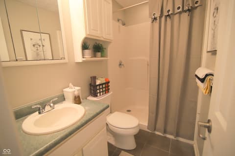 Bathroom at 104 Apple Tree Court, Fishers, IN — Clean, updated bathroom with modern fixtures and finishes.