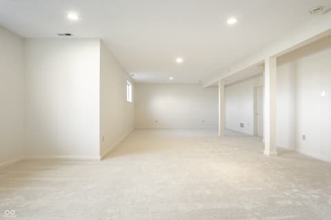Basement at 2444 Laurel Lake Boulevard, Carmel, IN — Spacious, bright finished basement with open floor plan.
