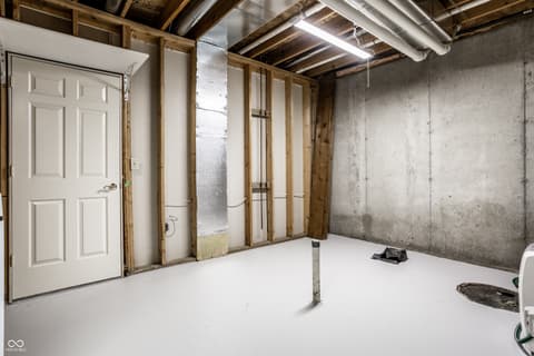 Basement at 2444 Laurel Lake Boulevard, Carmel, IN — Raw basement space ready for finished renovation.