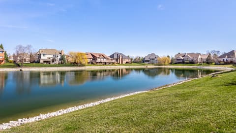 Backyard at 2444 Laurel Lake Boulevard, Carmel, IN — Stunning waterfront community with pristine lake views.