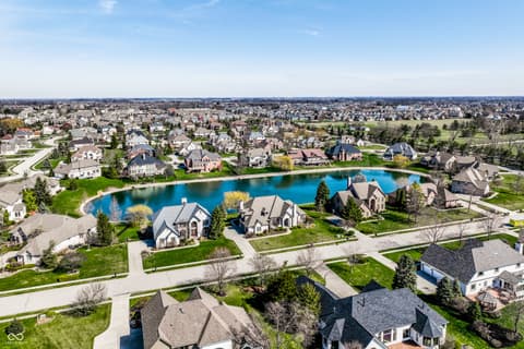 Aerial view at 2444 Laurel Lake Boulevard, Carmel, IN — Exclusive waterfront community with stunning lake views.