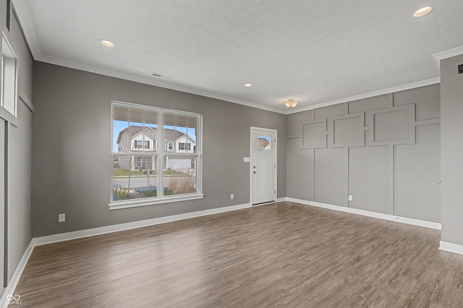 Bright, spacious primary bedroom with premium finishes.