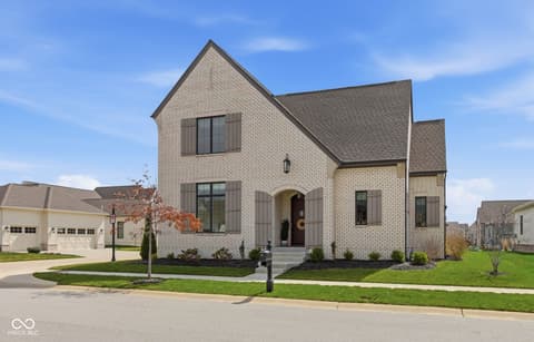 Front exterior at 1541 Cantata Lane, Westfield, IN — Stunning brick contemporary home with arched entry.