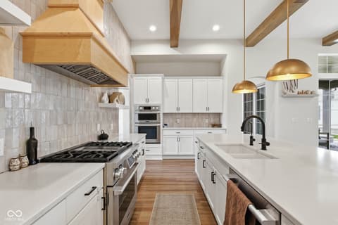 Kitchen at 1541 Cantata Lane, Westfield, IN — Modern chef's kitchen with premium appliances and finishes.