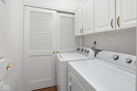 Laundry room at 6906 Harbour Woods Overlook, Noblesville, IN — Bright, modern laundry room with premium appliances.
