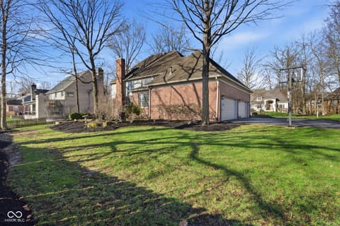 Front exterior at 5291 Woodfield Drive S, Carmel, IN