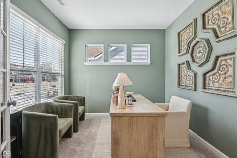 Home office at 82 Hovden Drive, Cicero, IN — Bright home office with sage walls and natural lighting.
