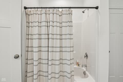 Bathroom at 82 Hovden Drive, Cicero, IN — Clean, updated bathroom with modern shower setup.