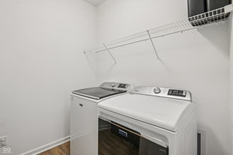 Laundry room at 82 Hovden Drive, Cicero, IN — Modern laundry room with new high-end appliances.