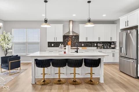 Kitchen at 12338 French Cattle Way, Noblesville, IN — Modern kitchen with luxury finishes and oversized island.