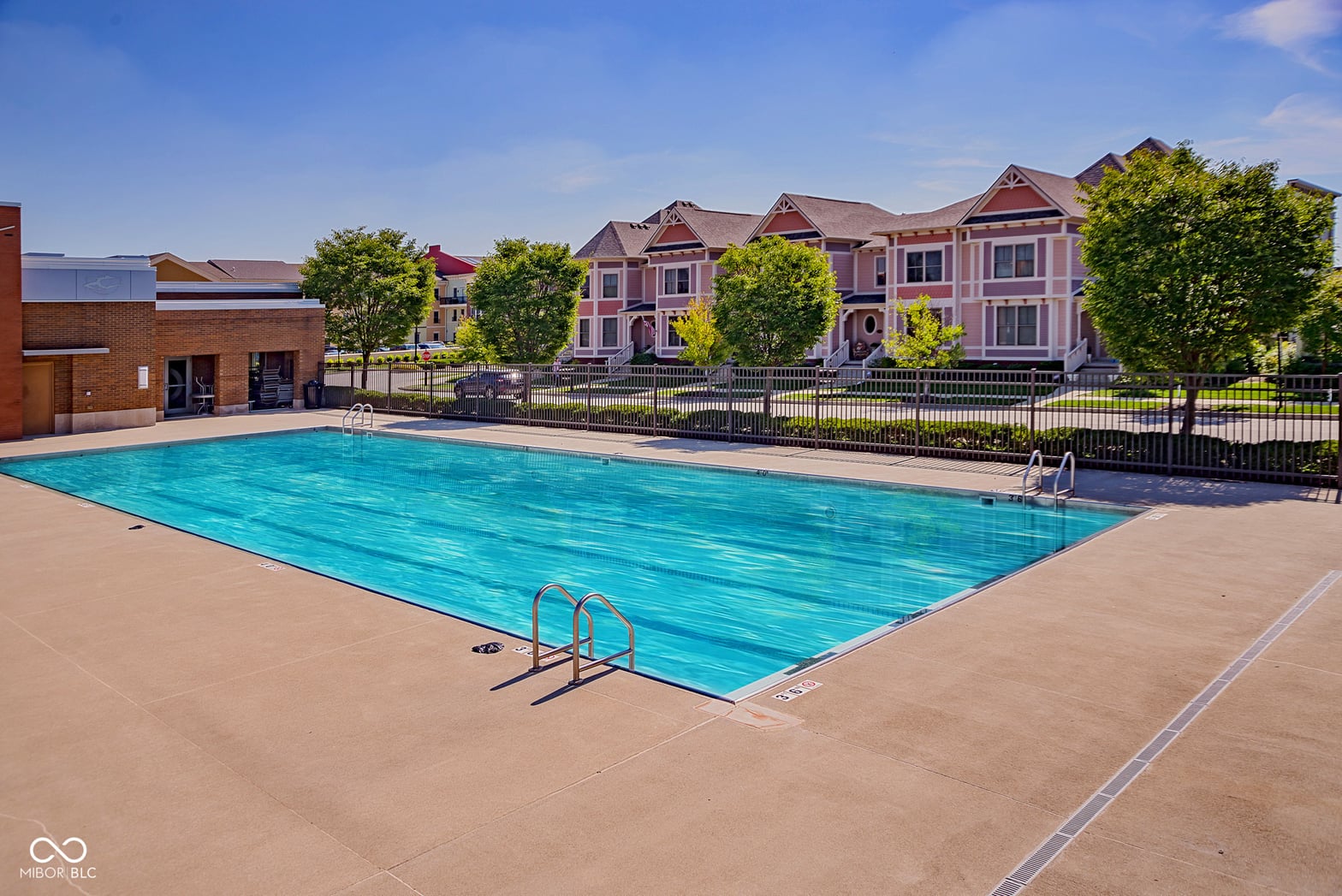 Well-maintained community pool with ample deck space.