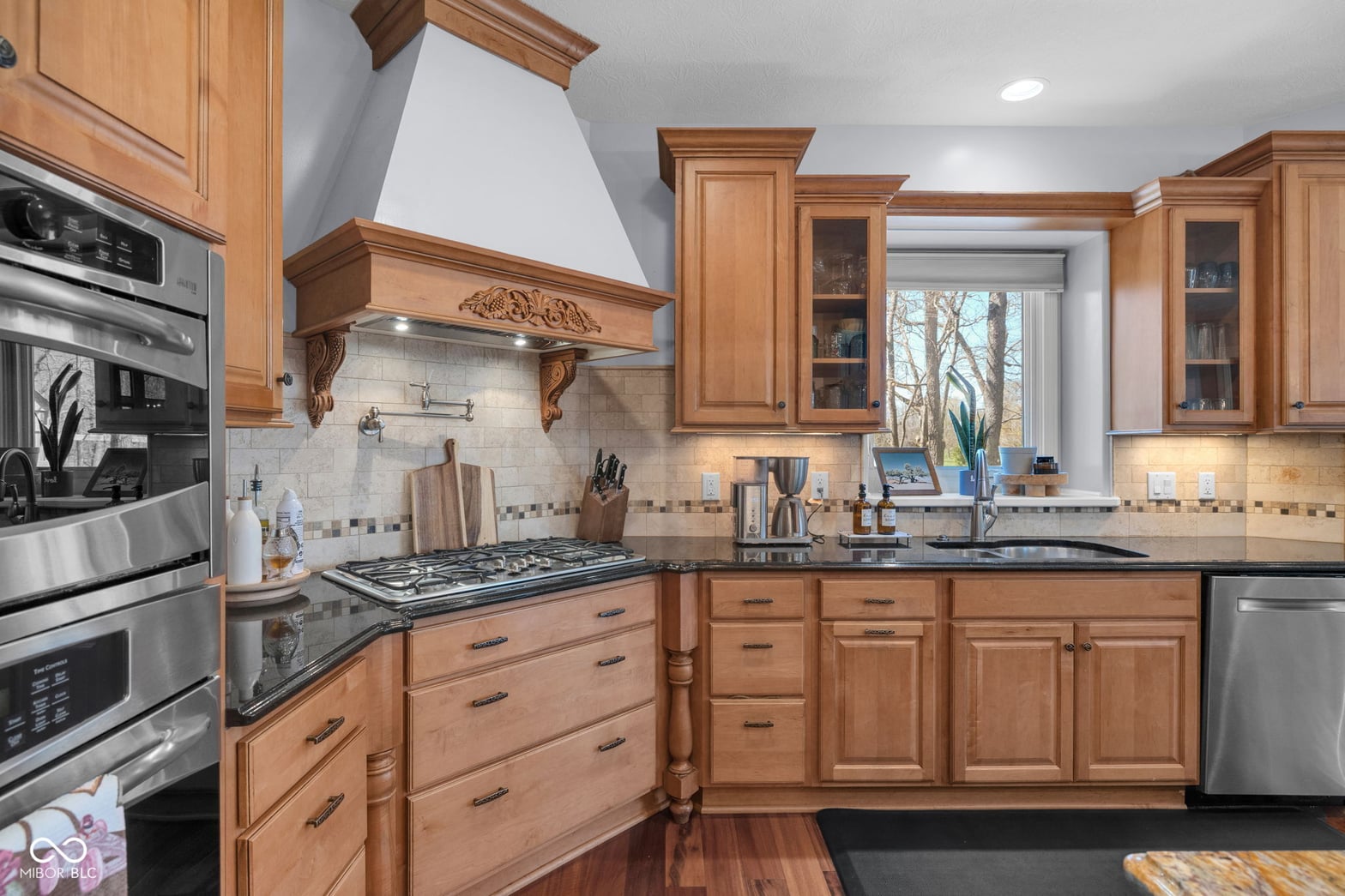 Elegant traditional kitchen with premium stainless appliances.