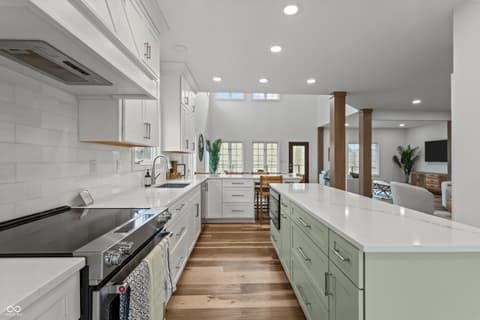 Kitchen at 96 Cedar Lane, Cicero, IN — Modern kitchen with white cabinetry and quartz counters.