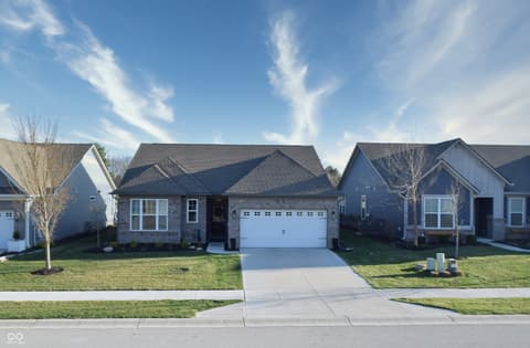 Front exterior at 6583 Apperson Drive, Noblesville, IN — New construction home with modern transitional style design.