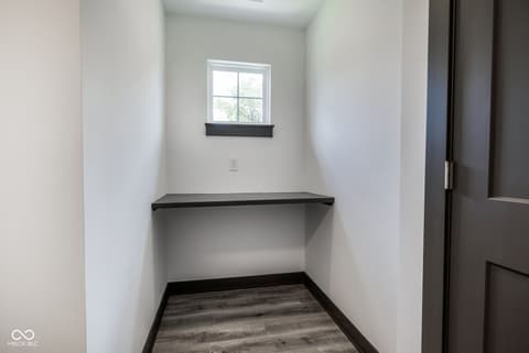 Home office at 18808 Cromarty Circle, Noblesville, IN — Bright modern office nook with built-in shelving.