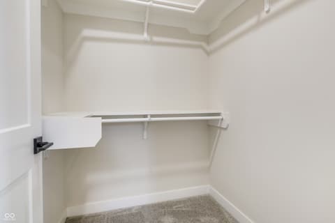 Bonus room at 18802 Cromarty Circle, Noblesville, IN — Bright, spacious walk-in closet with modern organization.