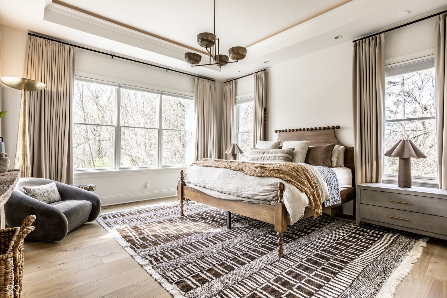 Spacious primary suite with abundant natural light and elegant finishes.