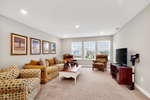 Living room at 9940 Delmore Drive, Fishers, IN
