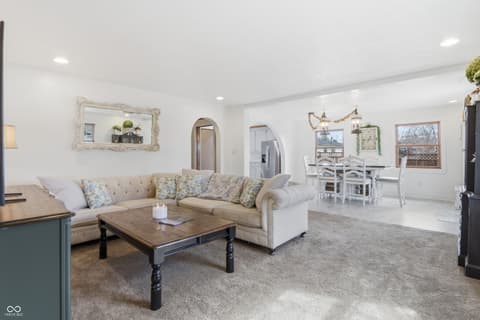 Living room at 1607 Cherry Street, Noblesville, IN — Bright open living space with elegant transitional design.