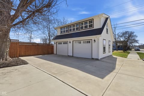 Garage at 1607 Cherry Street, Noblesville, IN — Modern two-car garage with updated architectural details.