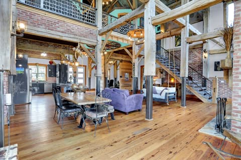 Living room at 25811 State Road 19, Arcadia, IN — Stunning loft with soaring ceilings and exposed beams.