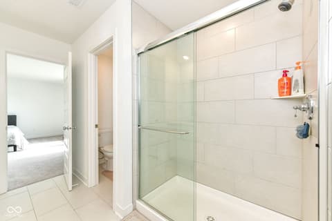Primary bathroom at 17267 Hanningfield Way, Westfield, IN — Spa-like primary bath with large walk-in shower.