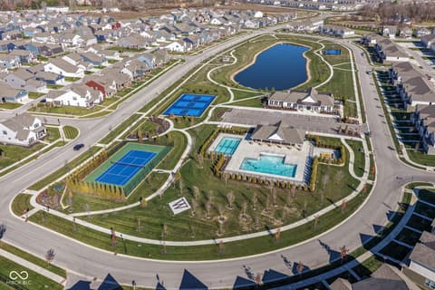 Aerial view at 17267 Hanningfield Way, Westfield, IN — Luxury community with resort amenities and pond views.