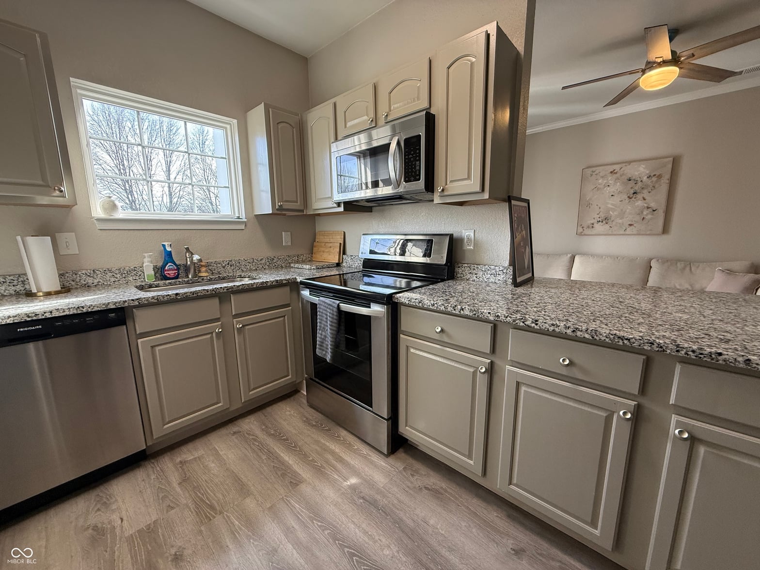 Updated kitchen with granite counters and stainless appliances.