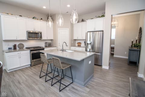 Kitchen at 15487 Heatherbank Drive, Westfield, IN — Bright modern kitchen with island and premium finishes.