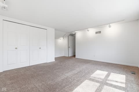 Primary bedroom at 15 Wildwood Drive, Carmel, IN