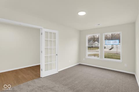 Bonus room at 19537 Atwater Avenue, Sheridan, IN — Bright bonus room with hardwood and carpet mix flooring.