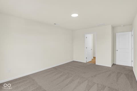 Bonus room at 19537 Atwater Avenue, Sheridan, IN — Bright bonus room with new carpet and recessed lighting.