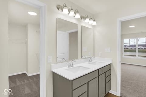 Primary bathroom at 19537 Atwater Avenue, Sheridan, IN — Spacious primary bath with dual vanity and modern fixtures.