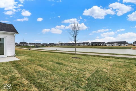 Backyard at 19537 Atwater Avenue, Sheridan, IN — Waterfront lot with pond views in new development.