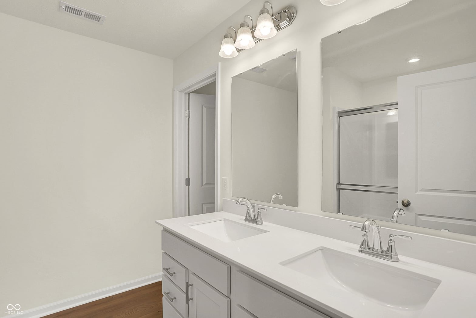 Primary bathroom at 19488 Atwater, Sheridan, IN — Luxurious primary bath with dual vanity and modern finishes.