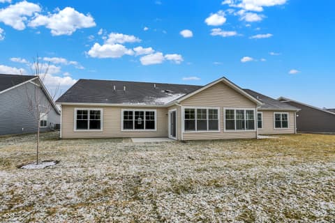 Front exterior at 19488 Atwater, Sheridan, IN — Bright new construction home with expansive windows.