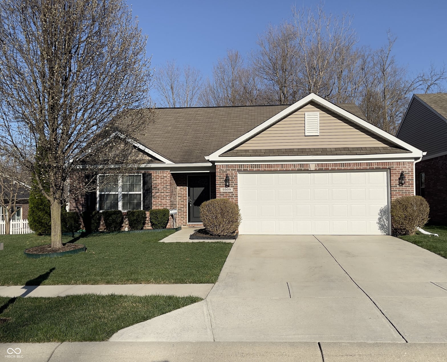 Front exterior at 9509 Woodsong Lane, Indianapolis, IN